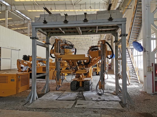 Automatic roof botler for coal mine